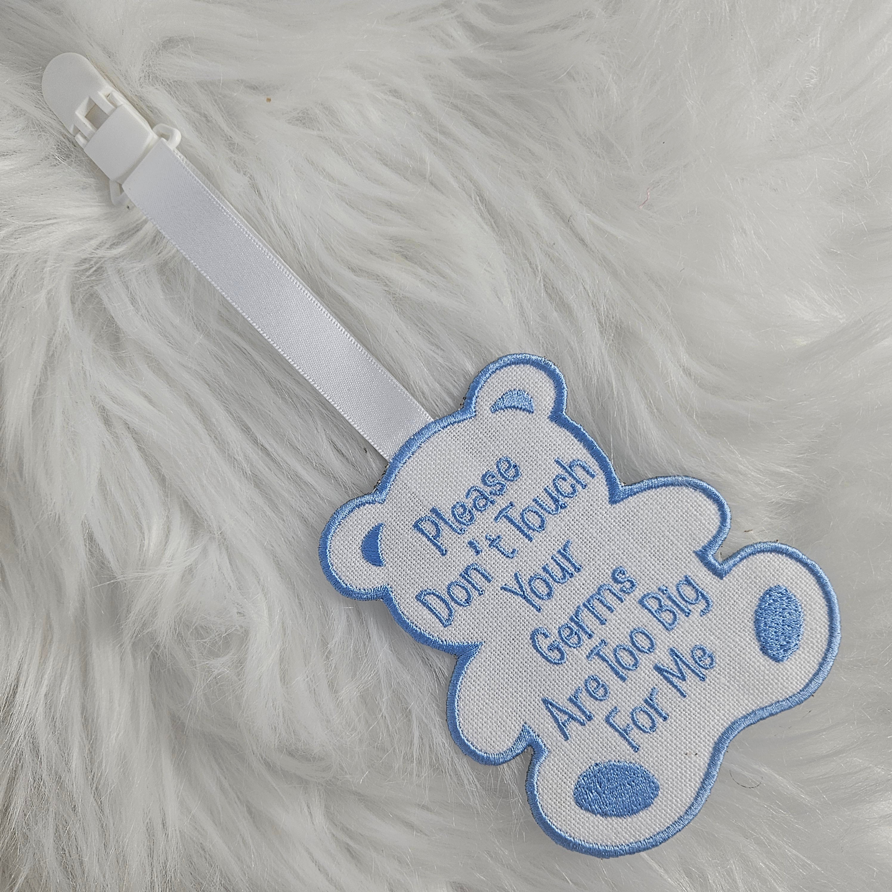 Blue collar sleepsuit bib tag