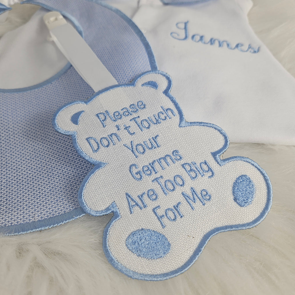 Blue collar sleepsuit bib tag